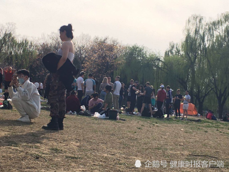 Foreigners gather together without masks, Chaoyang Park, Beijing